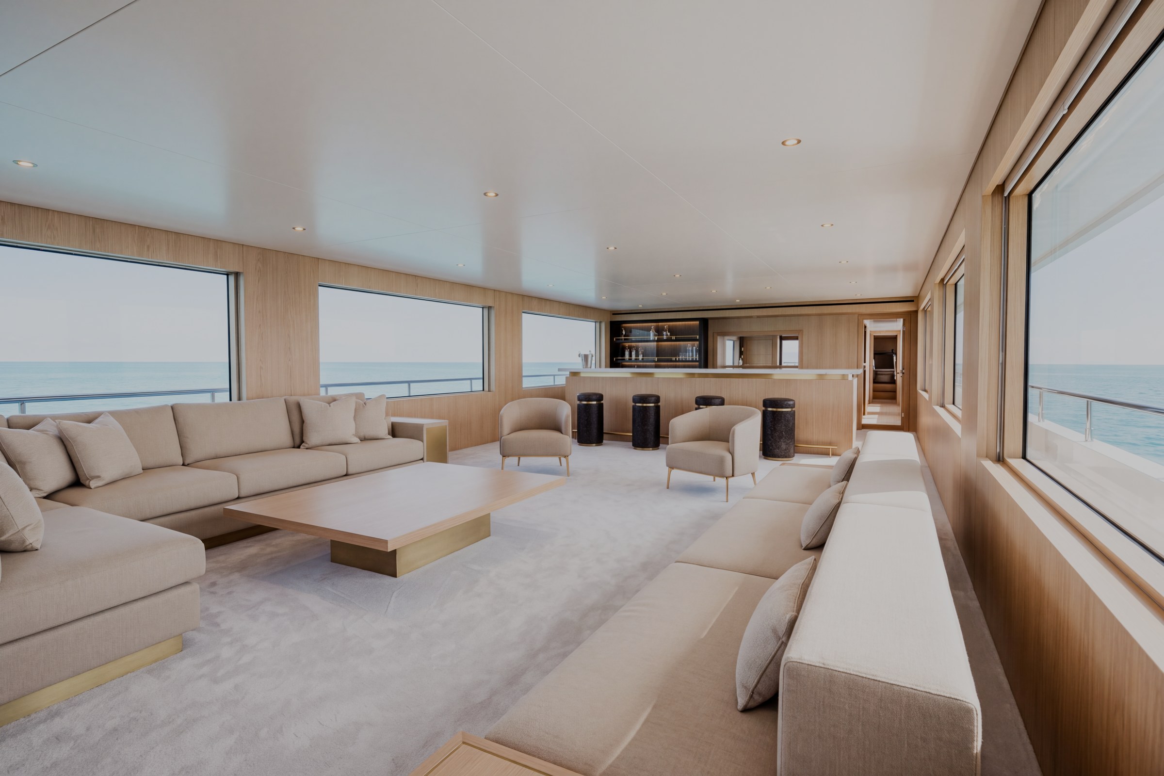 Sky lounge of the sample yacht with glazed windows and seating