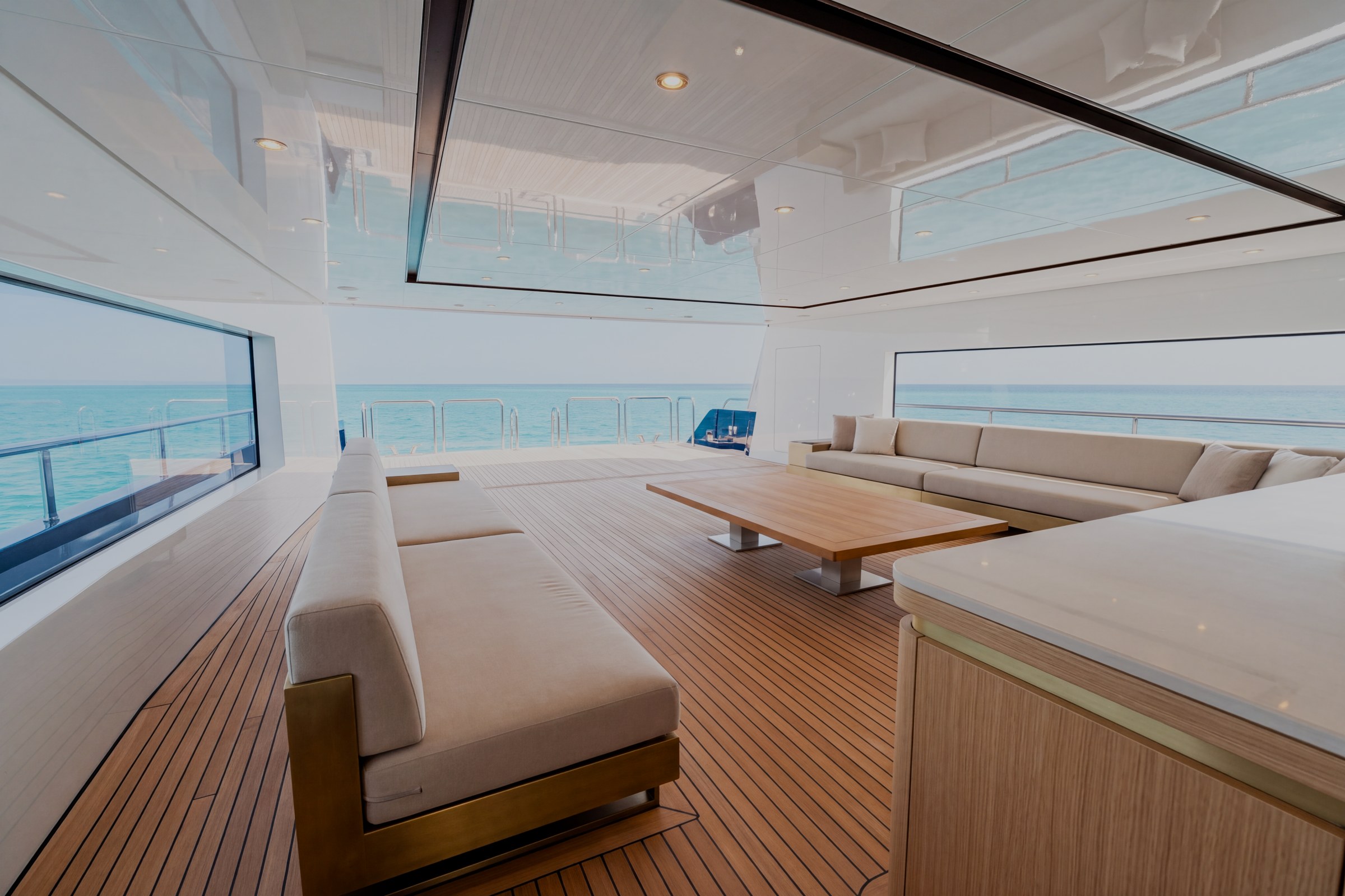 Beach club of the sample yacht with a swim-level platform and lounge